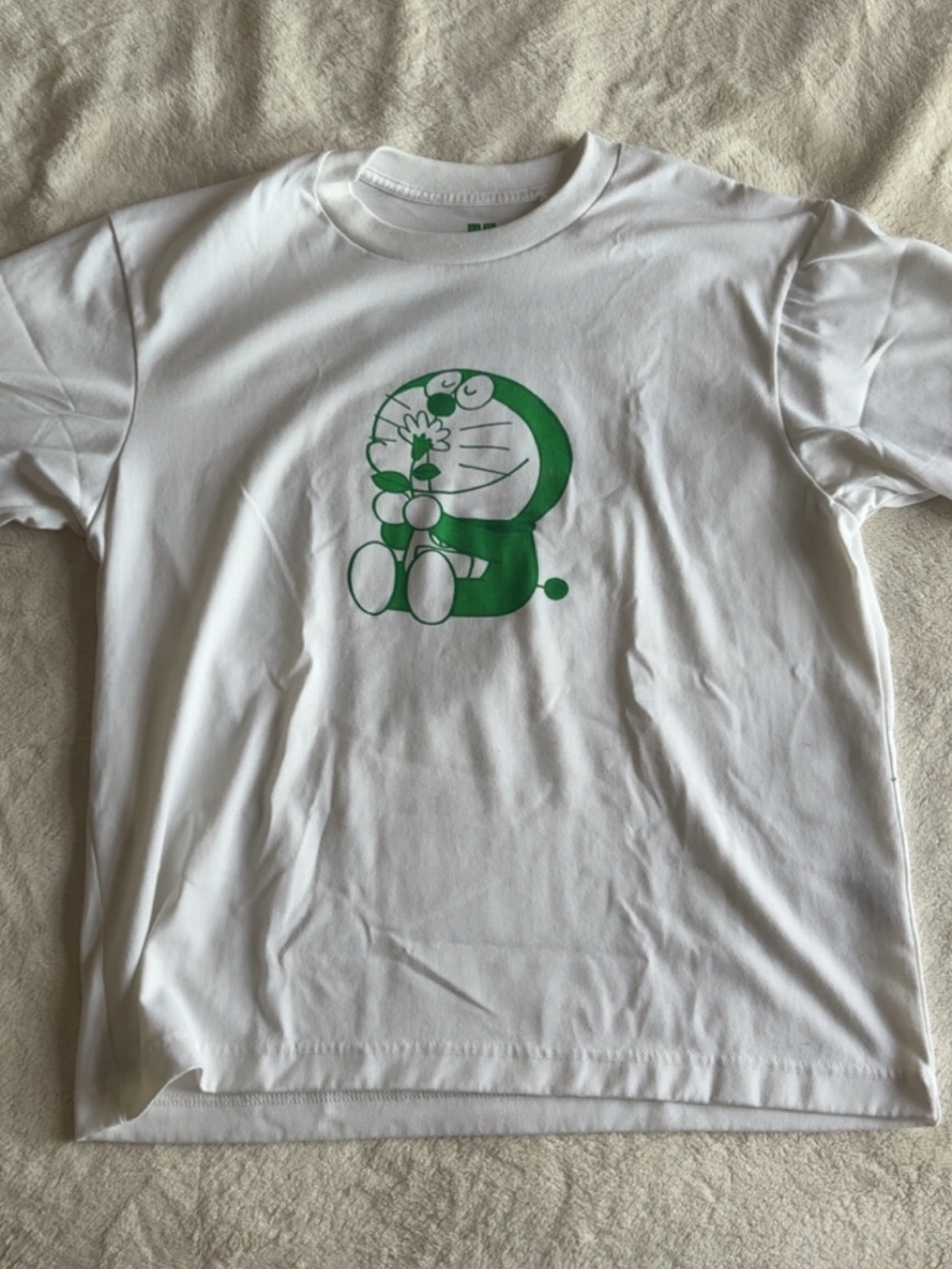 uniqlo doraemon white and green graphic tee